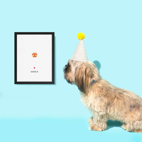 nose print for dogs birthday with dog looking at artwork