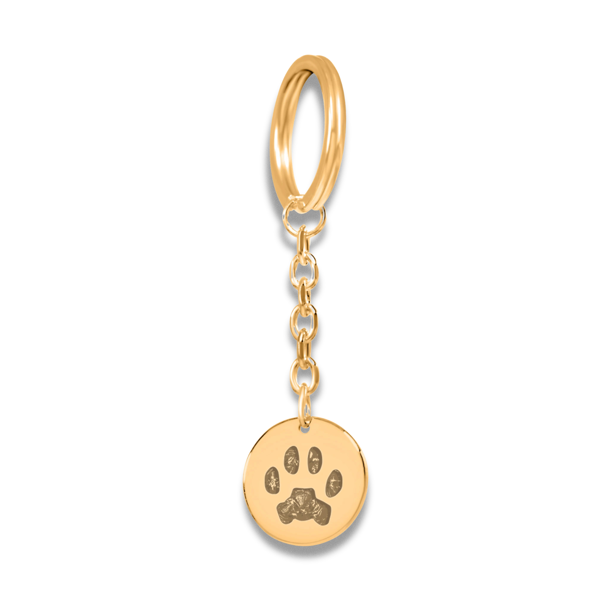 Gold keychain with a round coin pendant featuring an engraved paws printing. The simple, elegant design conveys warmth and affection, ideal for pet memorial gift.
