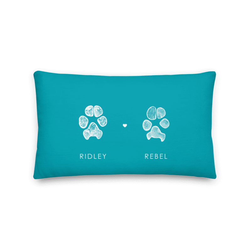 Customized pet paw print pillow measuring 20 by 12 inches for people with multiple pets.