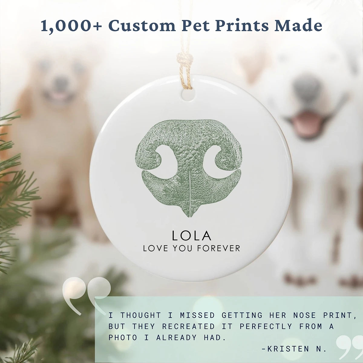 Round white ornament with a textured black dog nose print, small red heart, and the name “Jasper” beneath. Gold string for hanging attached at the top.