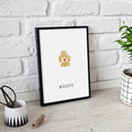 Tan colored cat paw print impression artwork with red heart in center displayed in black frame