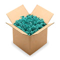 Box with turquoise crinkle paper for extra cushioning and looks like a gift