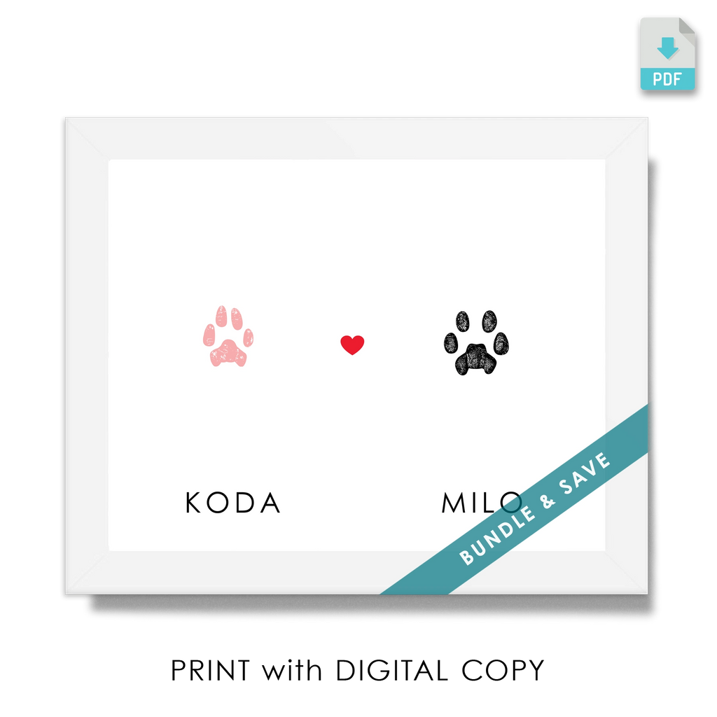 Framed print with two kitty cat paw prints, pink on the left labeled 