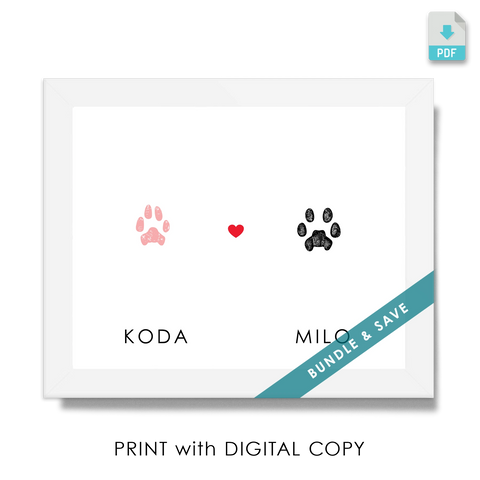Framed print with two kitty cat paw prints, pink on the left labeled 