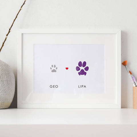 dog and cat paw print in white framed keepsake
