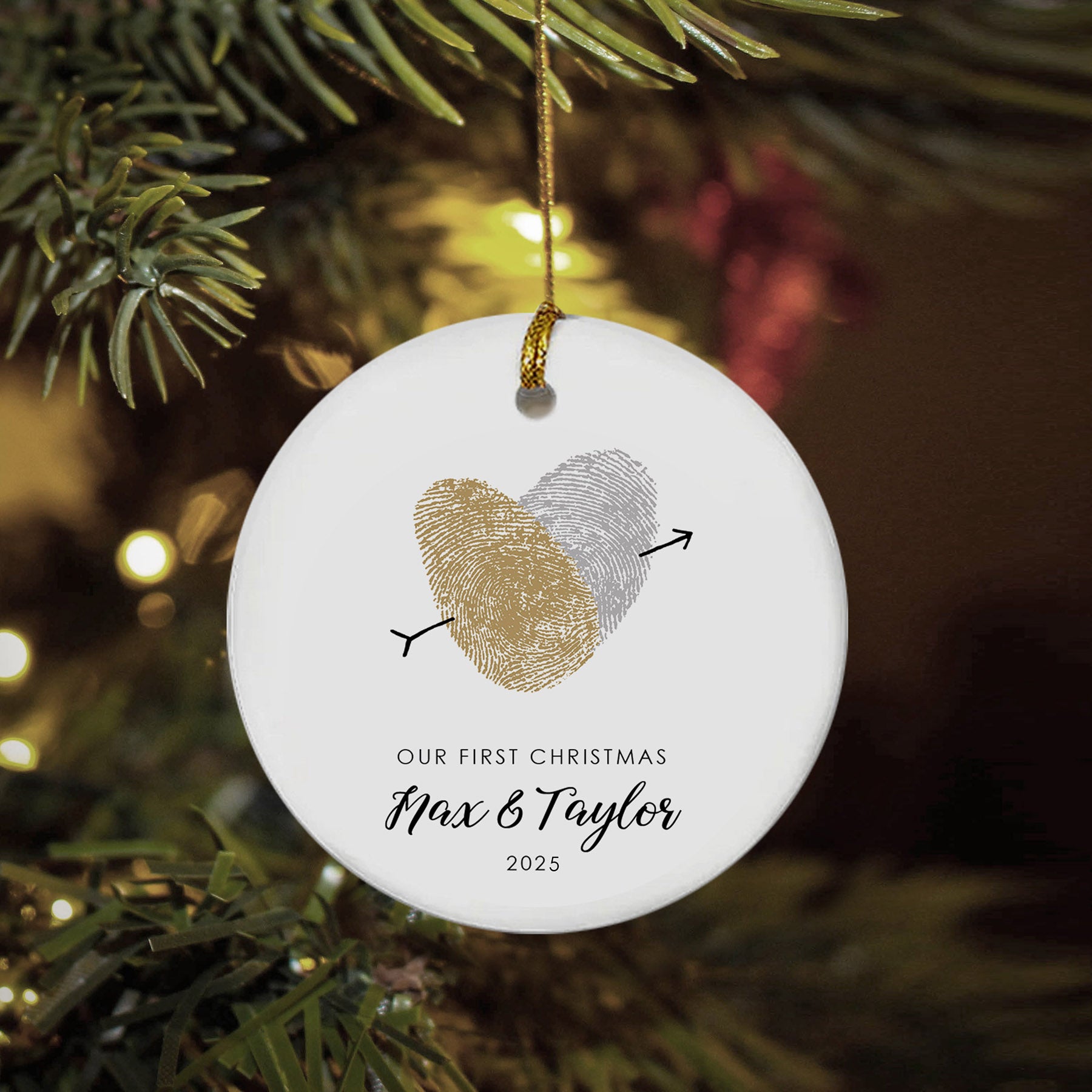 our first christmas married christmas ornament custom fingerprint holiday keepsake hung from christmas tree branch