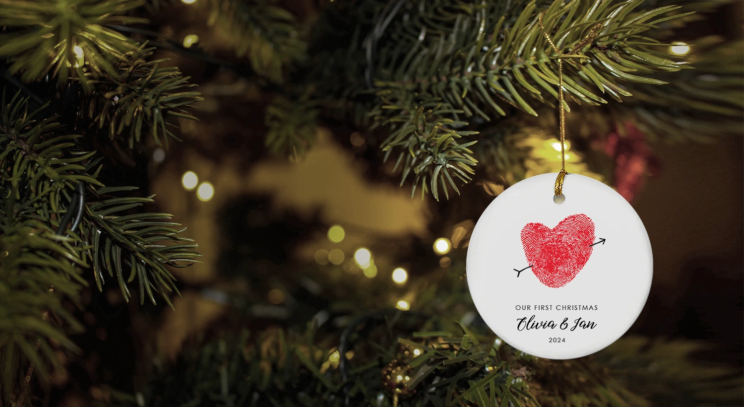 Black-framed print with a white fingerprint heart and sentimental text sits on a wooden shelf, beside a wedding photo, conveying love and intimacy.