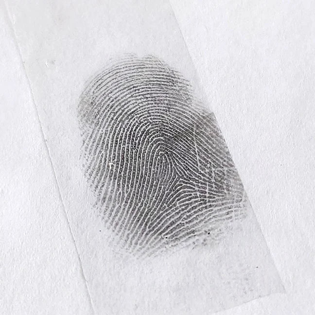 Close-up of a clear fingerprint on translucent tape against a white background, showing detailed ridge patterns. The tone is scientific and precise.