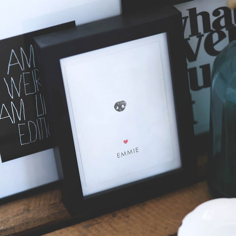 tiny dog nose print on display in frame