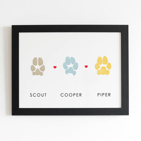 Framed paw print memento art for more than one dog with paw prints in multiple colors