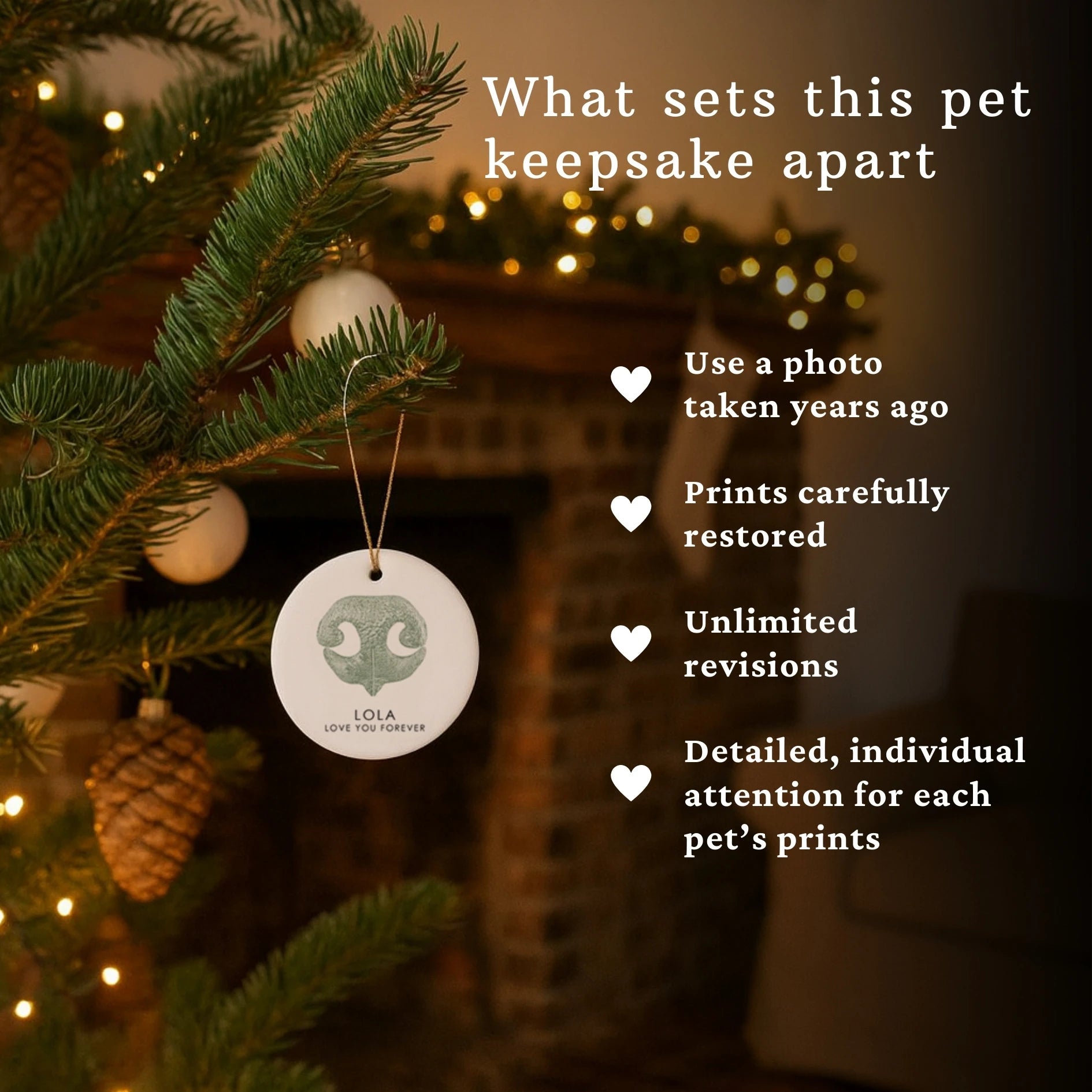 A decorated Christmas tree branch with a pet keepsake ornament featuring a dog nose print. Fireplace and lights create a cozy, warm atmosphere. Text highlights unique keepsake features such as photo use, restoration, revisions, and detailed attention.