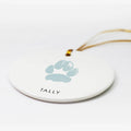 Christmas ornament with personalized blue cat paw print 