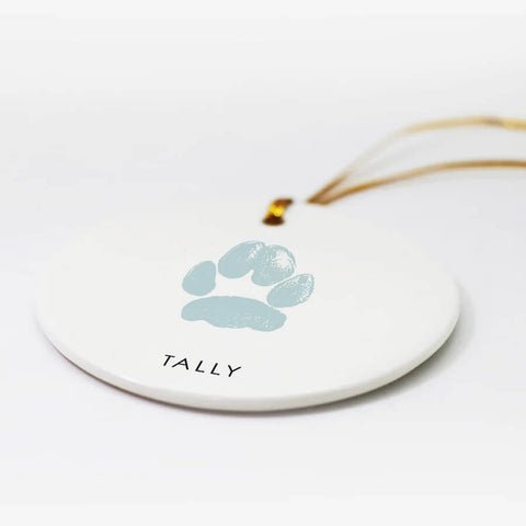 Christmas ornament with personalized blue cat paw print 