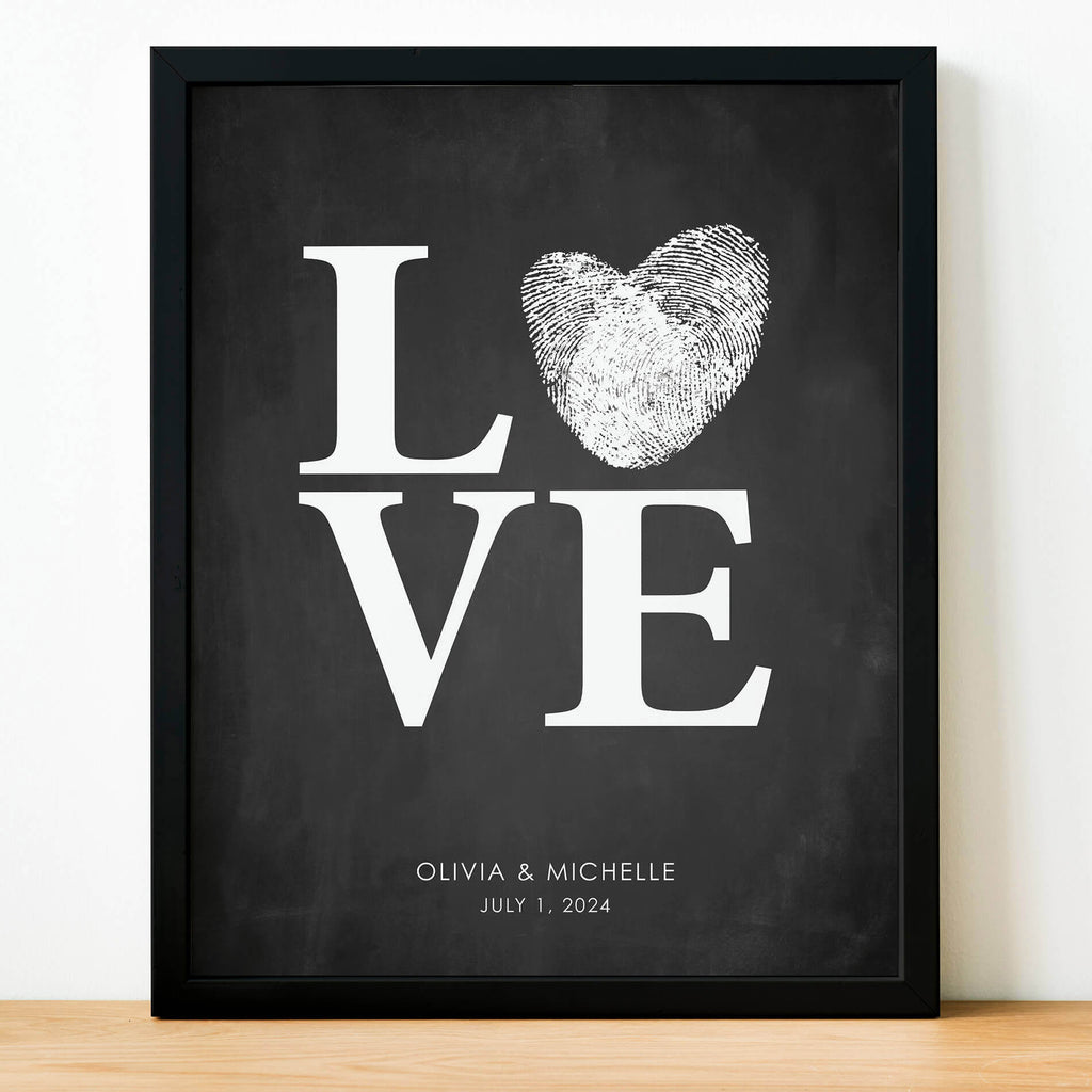Classic LOVE styled art print with a printed chalkboard effect and made with two fingerprints shaped into a heart to replace the letter o